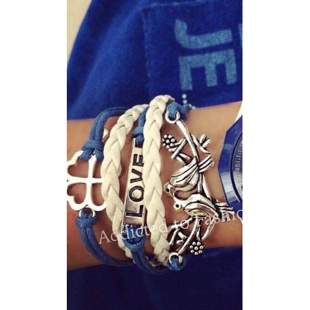 Blue suede bracelet set with various accessories