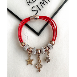 Red bracelet with beads and other accessories