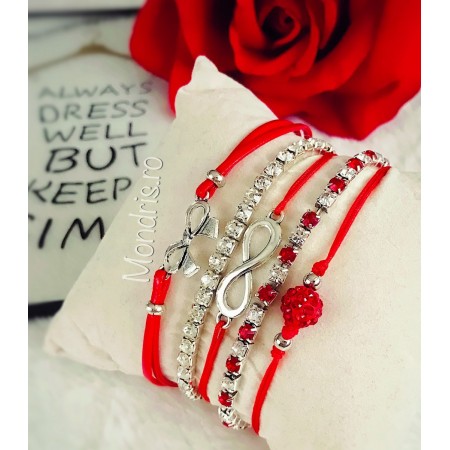 Set of 5 red ladies bracelets with various accessories