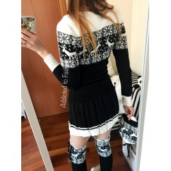 Complete black knit shirt made up of dress, hat and leggings