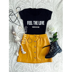 Short yellow imitation leather skirt